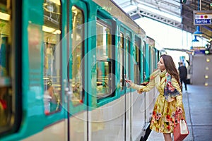 Woman waiting for a train