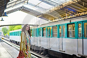 Woman waiting for a train
