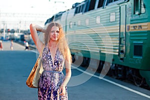 Woman waiting train on the platform