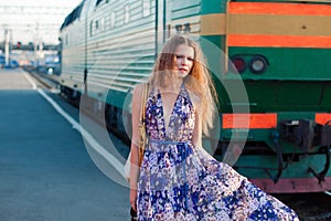 Woman waiting train on the platform