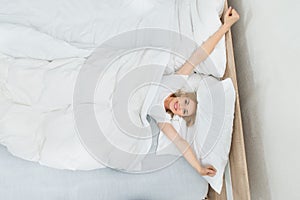 Woman Waking Up In Bed