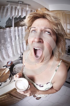 Woman waking up with a coffee