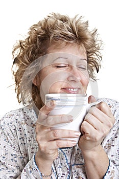 Woman waking up with a coffee