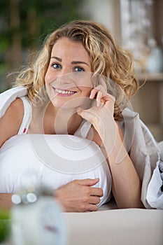 woman waking up with smile