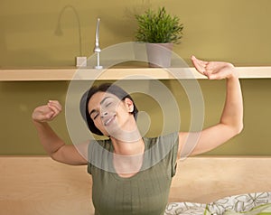 Woman waking up stretching