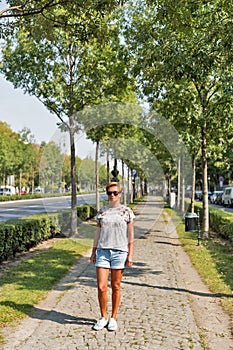 Woman walk along Andrassy Avenue in Budapest, Hungary. photo