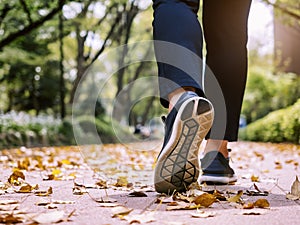 Woman walk Park outdoor Morning Exercise Healthy lifestyle