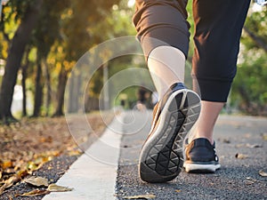 Woman walk in park outdoor workout exercise Healthy lifestyle