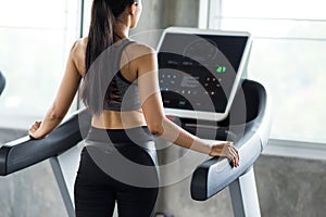 woman walk and run on treadmills in gym