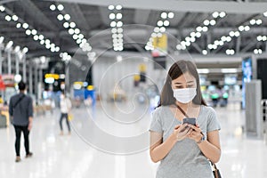 Woman walking in the airport terminal