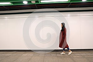 Woman walking alone at night