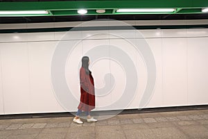 Woman walking alone at night