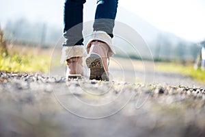 Woman walking along a rural path