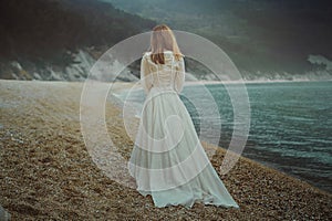 Woman walking on the beach