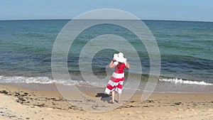 Woman walking on the beach
