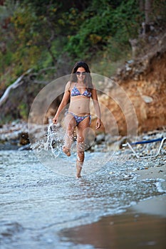 Woman walking at beach