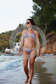 Woman walking at beach