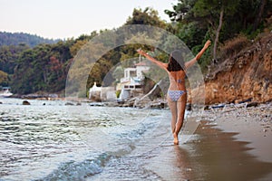 Woman walking at beach