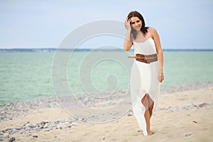 Woman walking on the beach