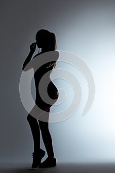 Woman walking black silhouette on gray background, fitness healthy lifestyle concept