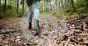 Woman Walking in Boots Lowangle View