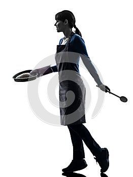 Woman walking cooking cake pastry silhouette