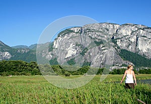 Woman walking in countryside