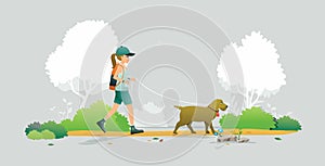 Woman walking with dog.