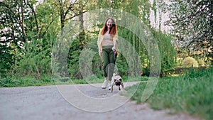 Woman walking the dog