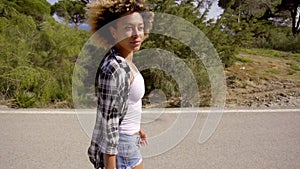 Woman Walking Down The Country Road