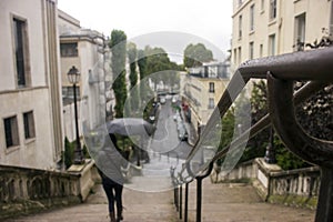 A woman walking down the stairs