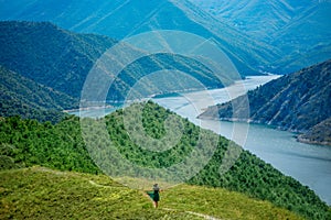 Woman walking on the mountains