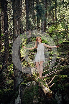 Woman walking in the mystery forest