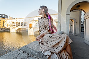 Woman walking old town of Florence, Italy