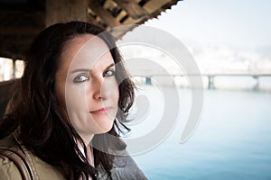 Woman walking on an old wooden bridge