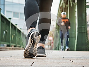 Woman walking Outdoor exercise in city Healthy lifestyle