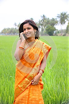 Woman walking in the paddy field