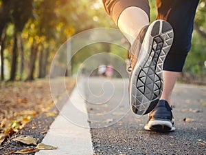 Woman walking in Park outdoor Workout Trail Exercise Healthy lifestyle