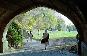 Woman walking in park, Prospect Park, Brooklyn New York USA