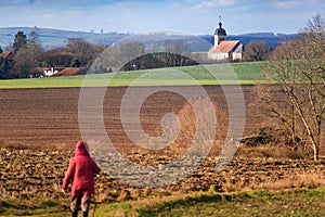 Woman walking on a path outdoors, hiking pratice for relaxing and staying healthy photo