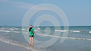 Woman walking relax on beach