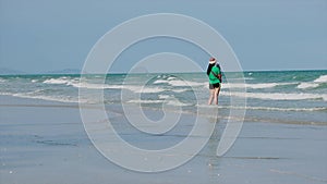 Woman walking relax on beach