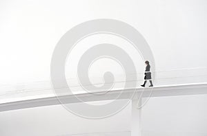 Woman walking in runway photo
