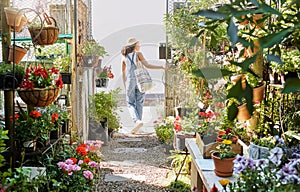 Woman, walking or shopping in small business florist or green leaf plants, flowers or sustainability growth. Garden