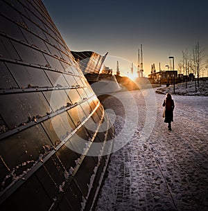 Woman walking on sunset