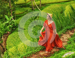 Woman walking on Tegalalang Rice Terrace, Bali