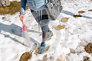 Woman walking thru the thaw making steps