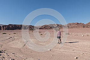 Woman walking in tima national park in