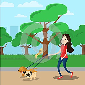 Woman walking with two dog