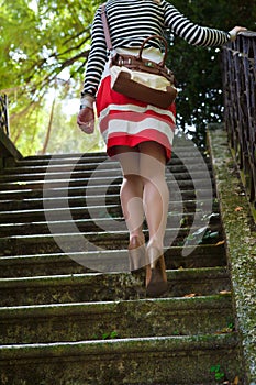 Woman walking up stairs